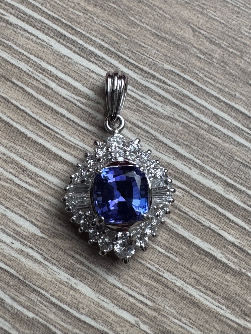 Tanzanite 1.52 carat with 0.75 carat natural diamonds in platinum 4g in total